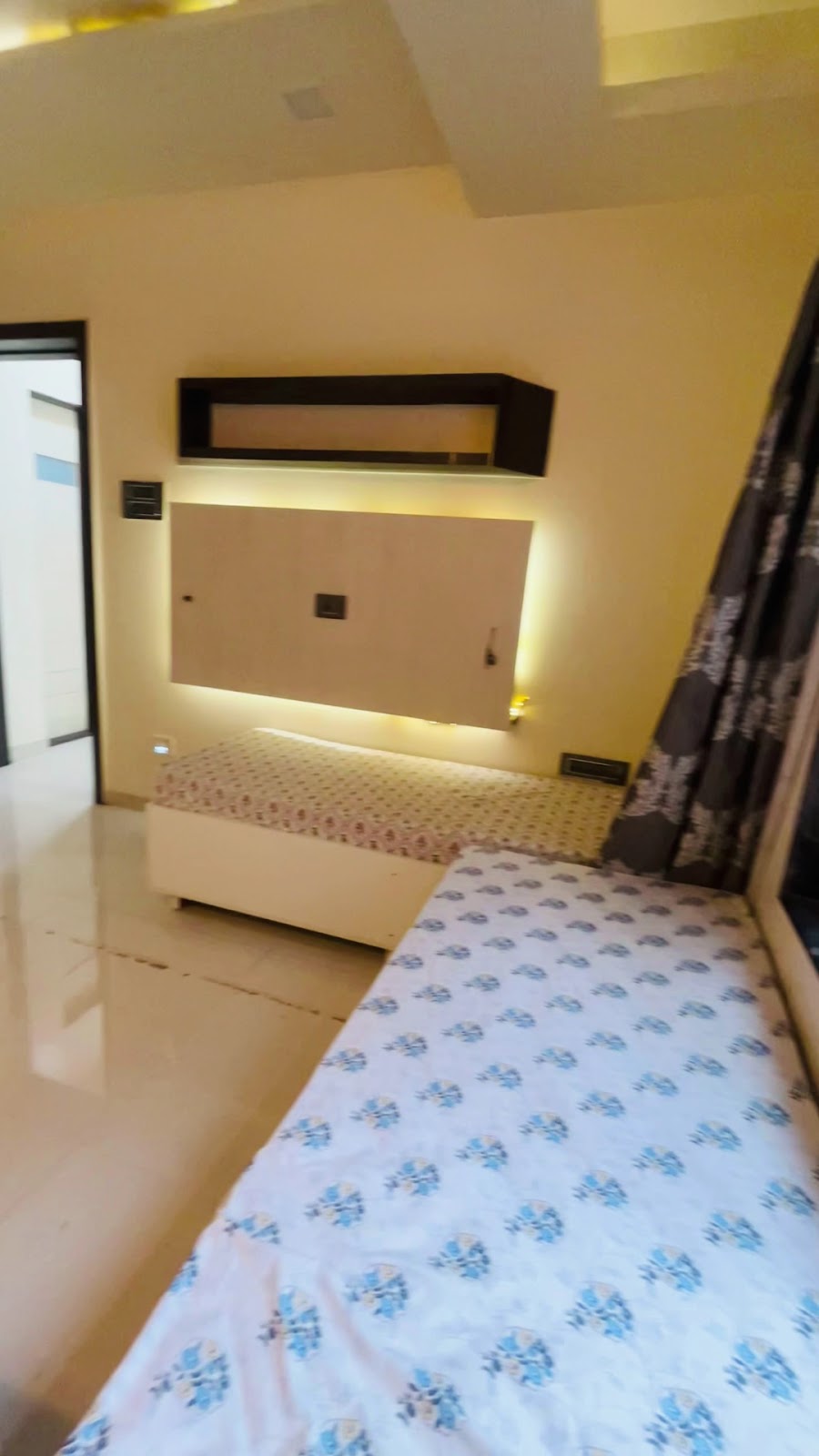 Cozy Single Cot View with Floral Printed Mattresses