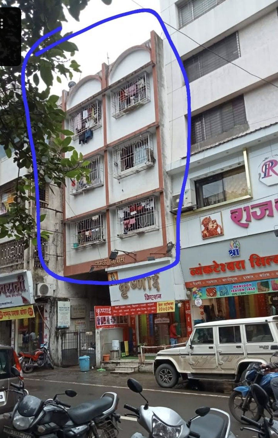 Kumthekar Road Building Exterior with Street Frontage